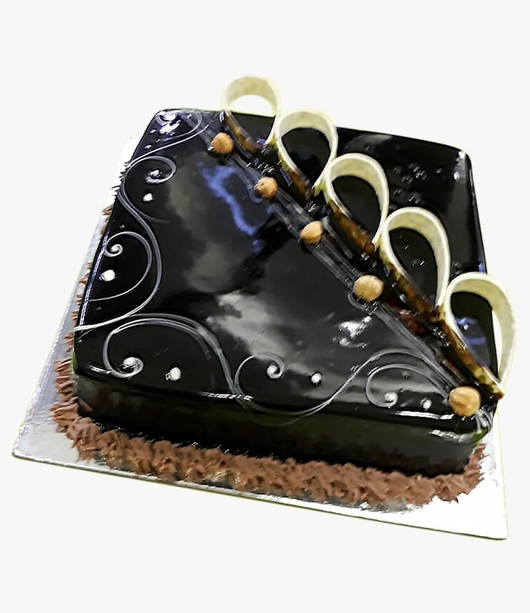 Square-shaped Chocolate Cake with Hazelnut Decoration 