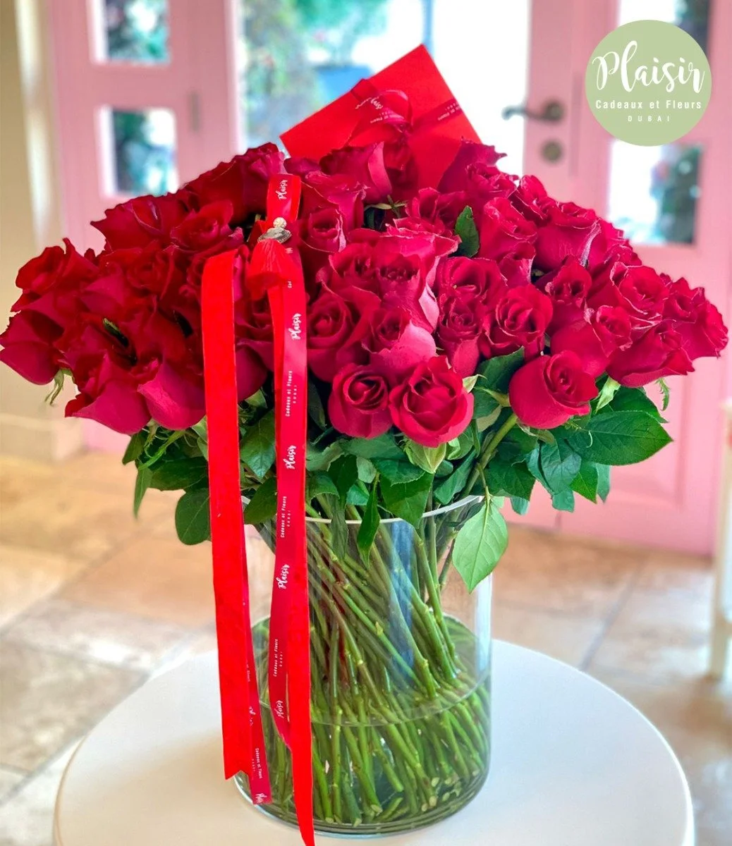 65 Exquisite Red Roses in Vase By Plaisir
