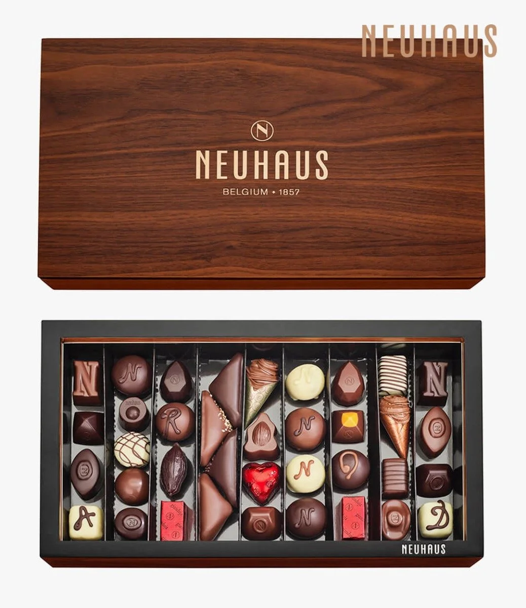 روائع الشوكولاتة في صندوق الضيافة الخشبي من نيوهاوس