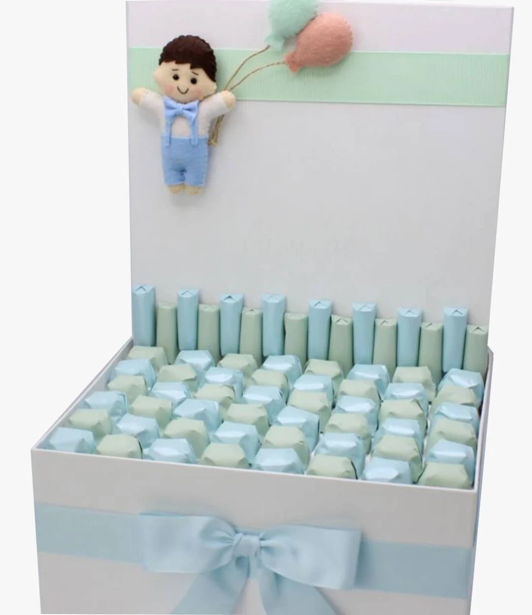 Babyboy With Balloons Decorated Chocolate Basket By Le Chocolatier