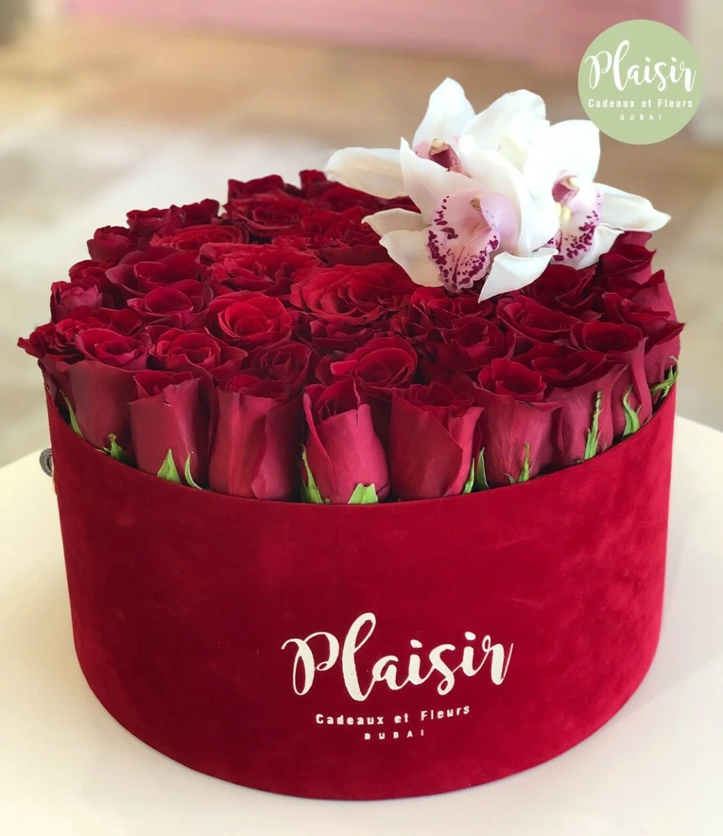Fresh Red Roses With Cymbidium Blooms In A Hatbox By Plaisir