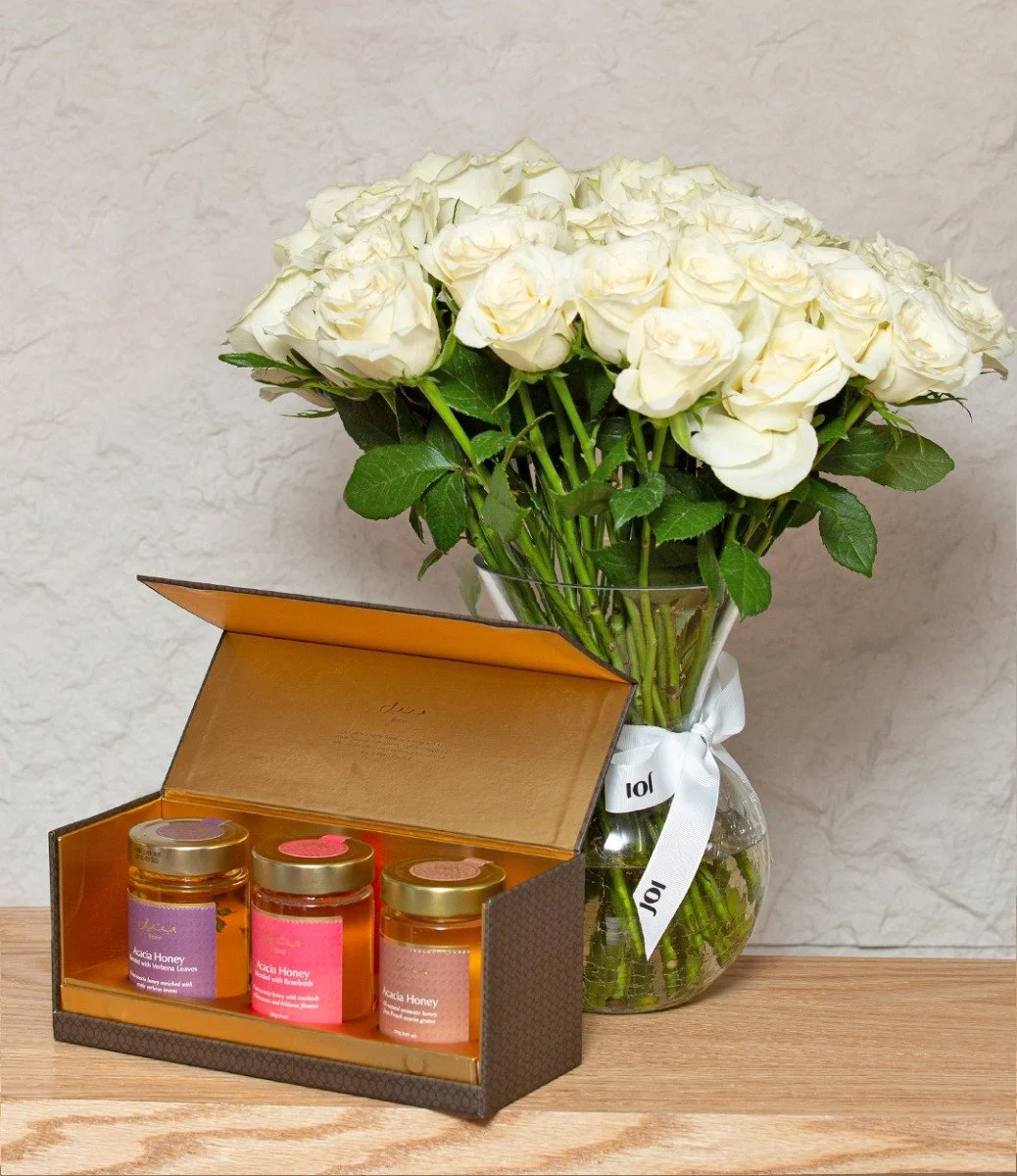 مجموعة هدايا العسل من بتيل وباقة الزهور