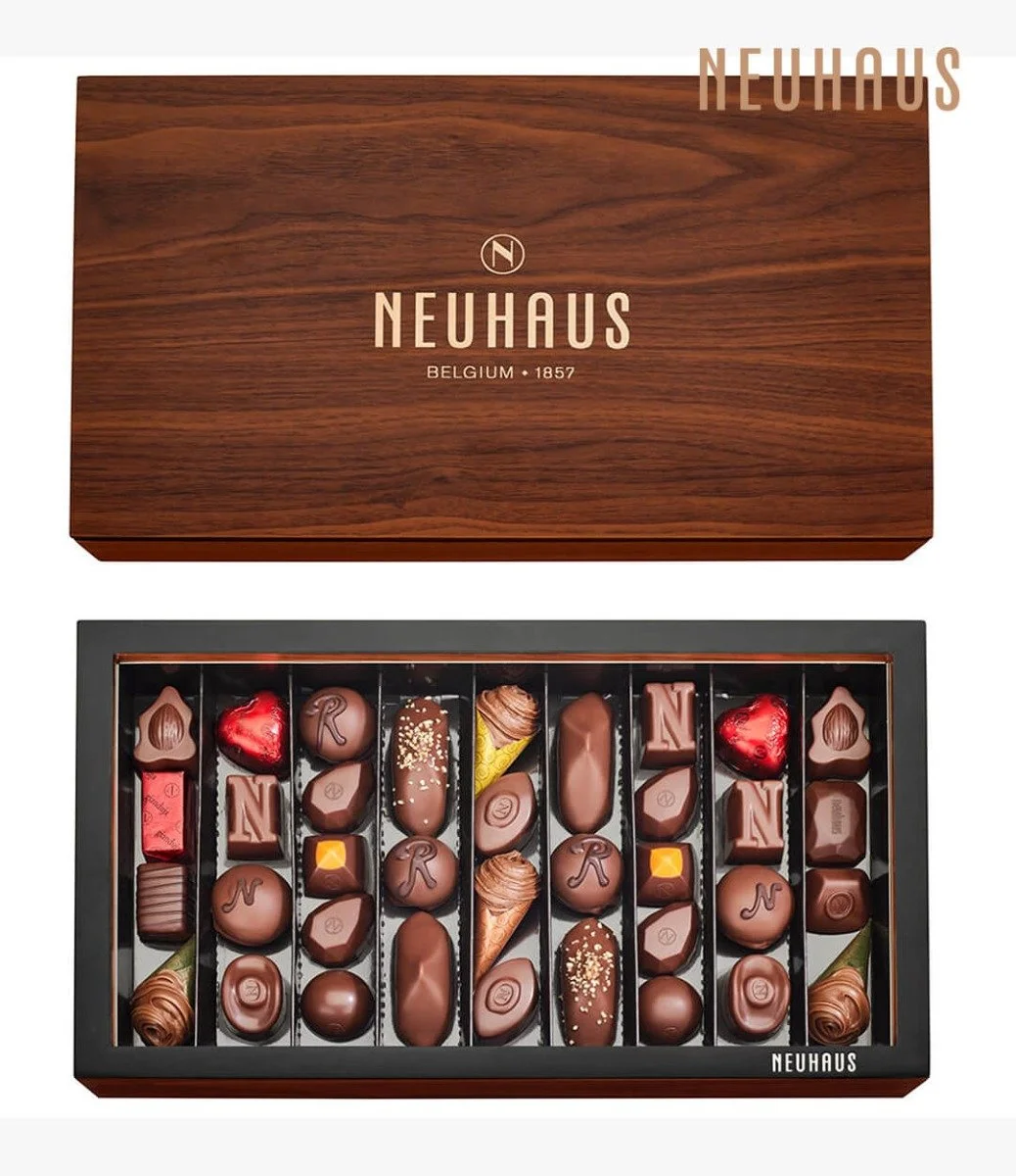 شوكولاتة بالحليب في صندوق الضيافة الخشبي من نيوهاوس