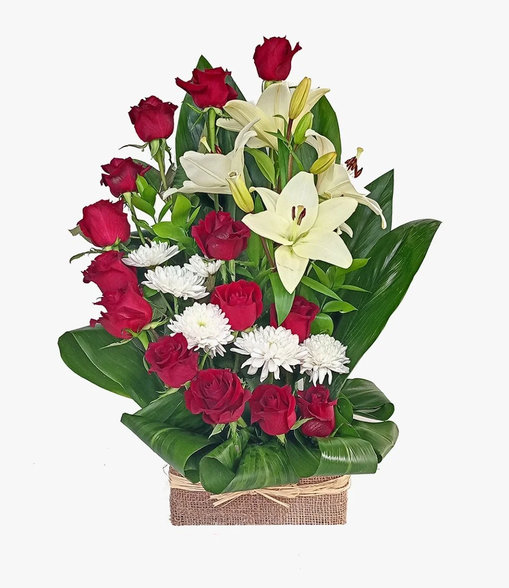 Red Roses Ascending Design With White Lilies Standing Arrangement