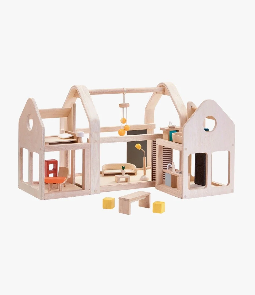 Slide N Go Dollhouse By Plan Toys
