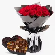 باقة 12 وردة حمراء رومانسية مع صندوق شوكولاتة قلب أحمر - كبير من جيف دي بروج