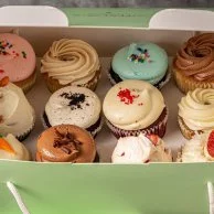 A Dozen Assorted Cupcakes by Sugar Daddy's Bakery 