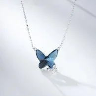 Blue Butterfly Necklace by La Flor