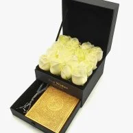 A Box of White Roses with a Golden Quran Book & a Rosary