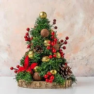 شجرة كريسماس مع زينة صالحة للأكل من أن جيه دي