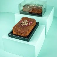 Date Cake topped with 3D Chocolates & Rose Petal by The Date Room