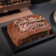 Date Cake topped with 3D Ramadan Kareem Chocolates & Rose Petals by The Date Room