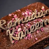 Date Cake topped with 3D Ramadan Kareem Chocolates & Rose Petals by The Date Room