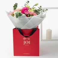 IWD/Mother's Day Flowers in a Red Bag