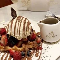 Coffee, dessert and balloons bundle at Godiva Cafe