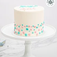 Polka Dots Gender Reveal Cake by Magnolia