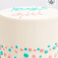 Polka Dots Gender Reveal Cake by Magnolia