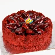 Red Velvet sponge cake with strawberry topping  by Secrets 