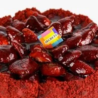 Red Velvet sponge cake with strawberry topping  by Secrets 