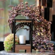 The purple Garden Arrangement with Candle 