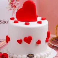  White Cake with Red Hearts by The Cake Shop 