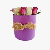White and Purple Roses in a Round Purple Box