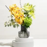 تنسيق زهور سوليداجو الصفراء