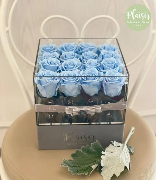 Baby Blue Infinity Roses In Square Acrylic Box By Plaisir