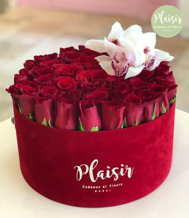 Red Hat Box Red Roses With Orchids By Plaisir