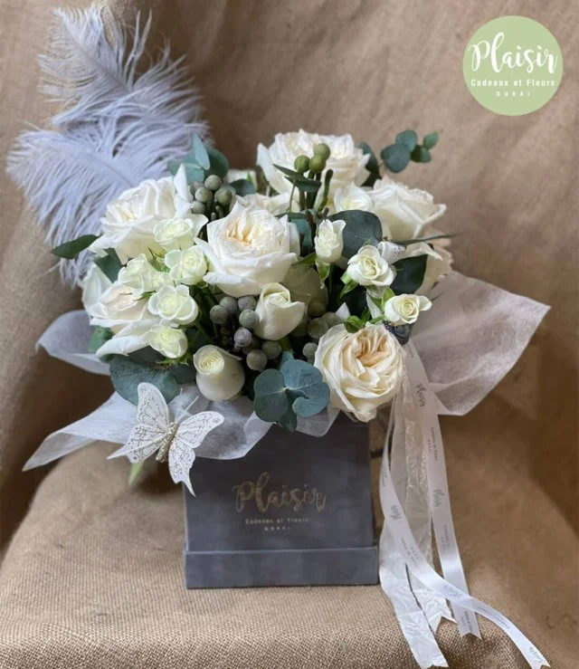 White Flowers in Grey Box with Feathers By Plaisir