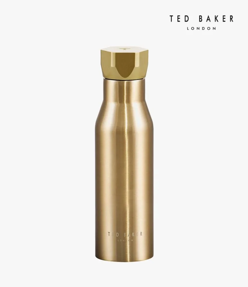 زجاجة ماء بغطاء سداسي لون ذهبي شاحب من تيد بيكر