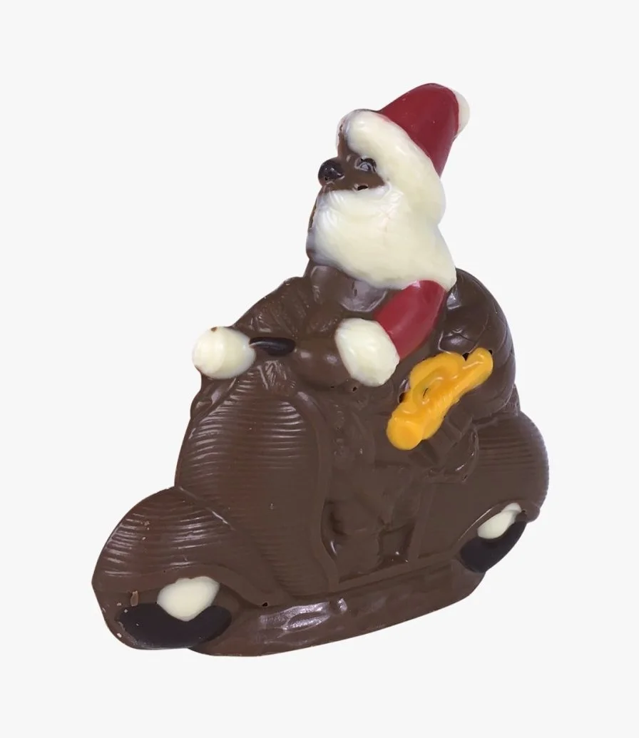 شوكولاتة مجسمة بشكل بابا نويل وموتوسيكل