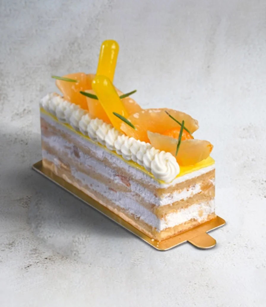 1 piece of Pineapple & Melon Gateaux  by Bloomsbury's