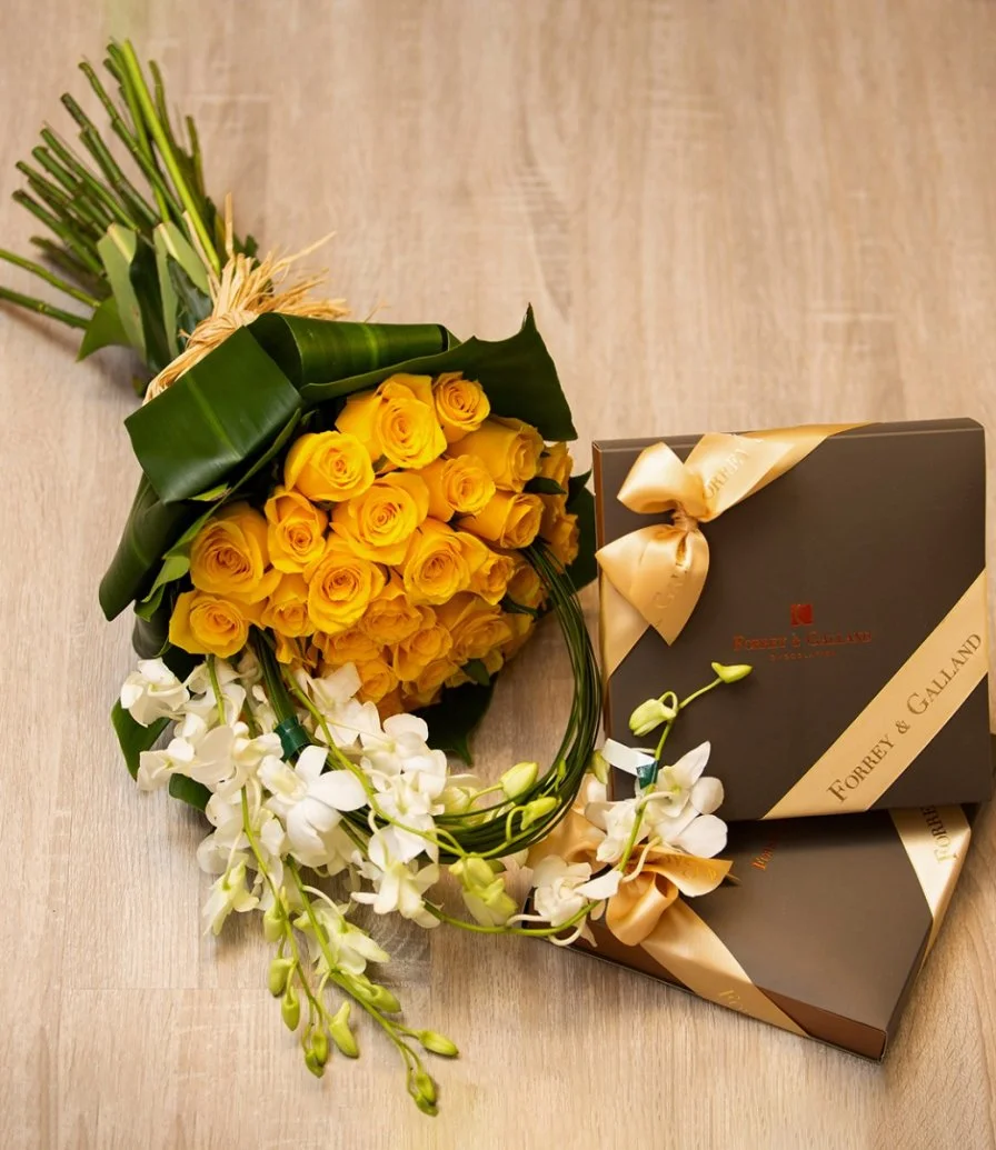 مجموعة شوكولاتة كلاسيكية فرنسية من فوري وجالاند مع زهور