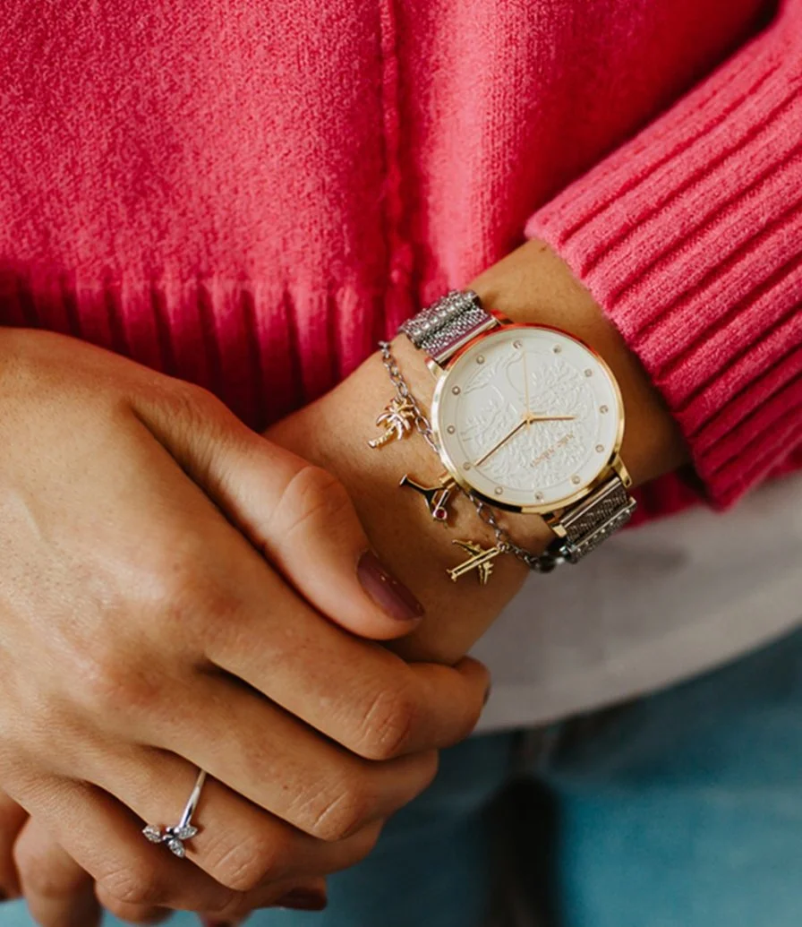 ساعة جولي جولسن ذهبية وفضية للنساء