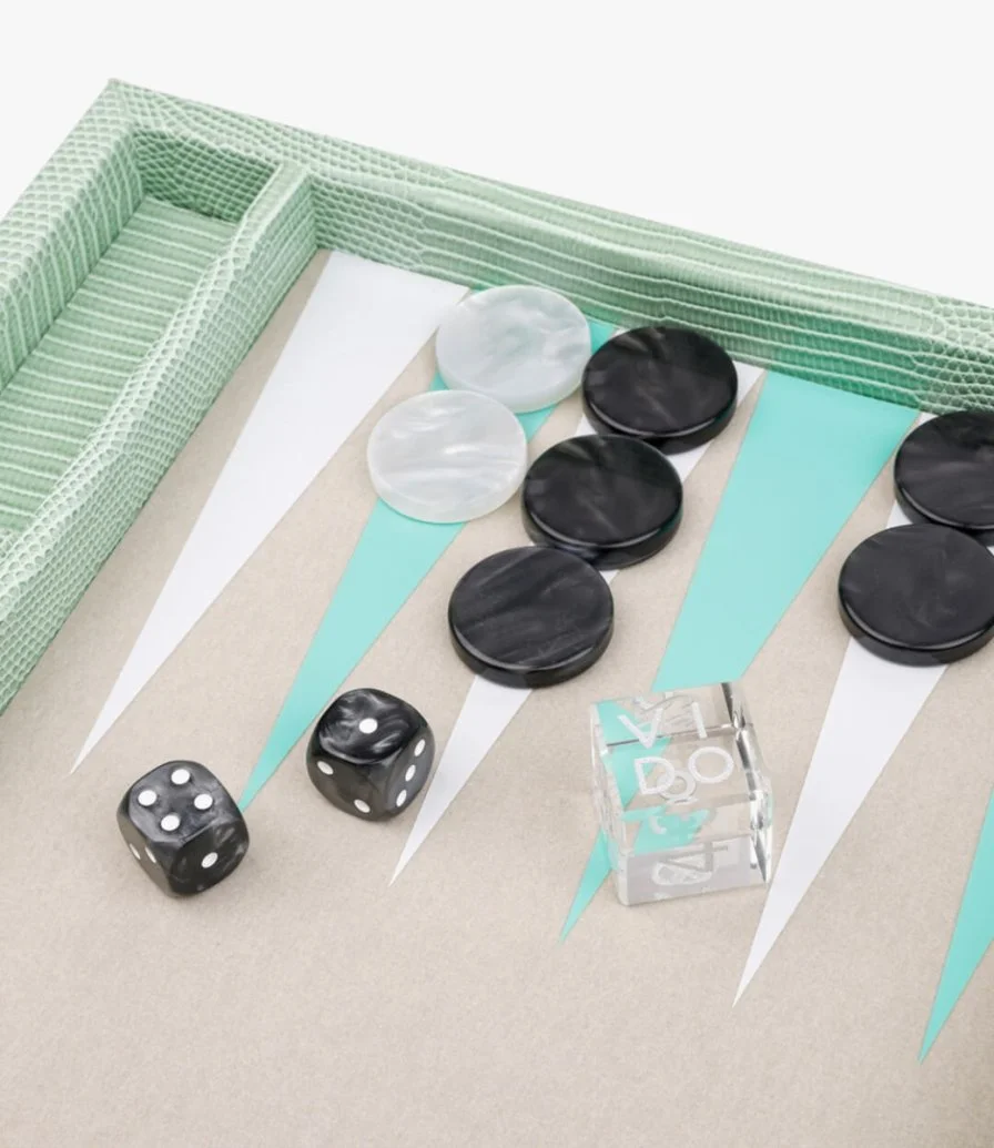 لعبة الطاولة وسط أخضر نعناعي من فيدو باكجامون