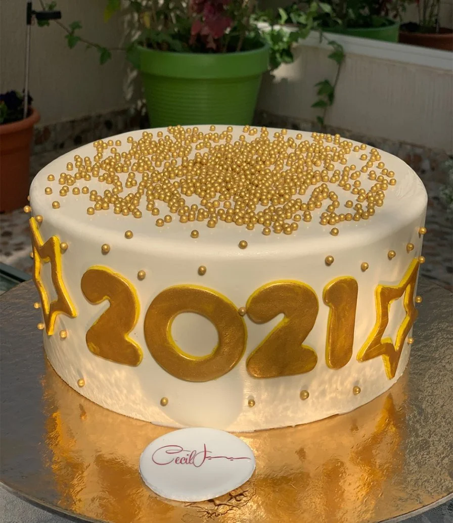 كيكة احتفالات العام الجديد باللون الذهبي 