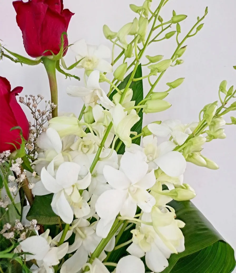 Red Roses and White Baby Orchids