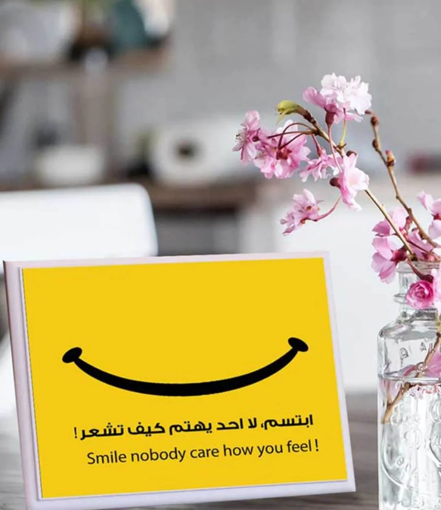 Wooden Plaque With An Arabic Quote About Happiness