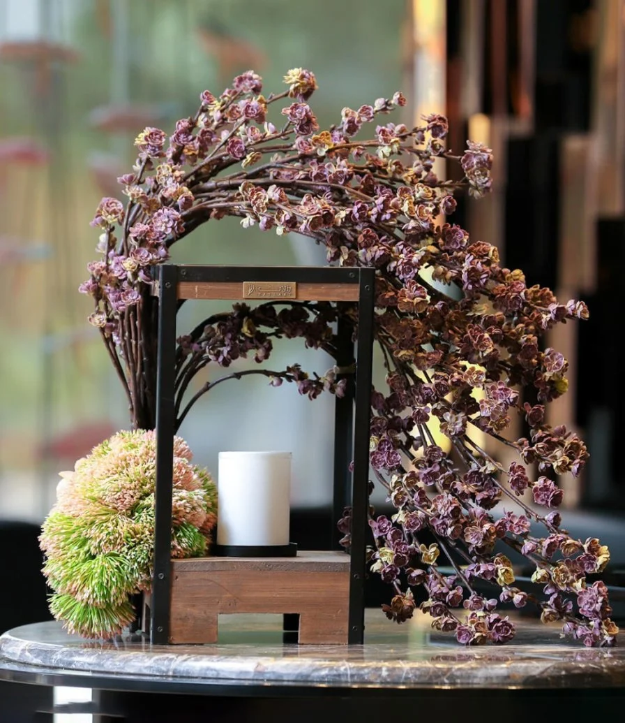 The purple Garden Arrangement with Candle 