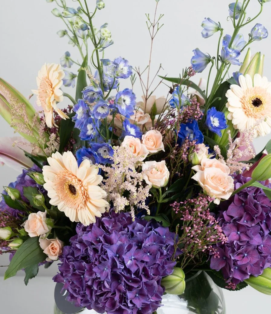 The Purple Vibrant Mix Flower Arrangement