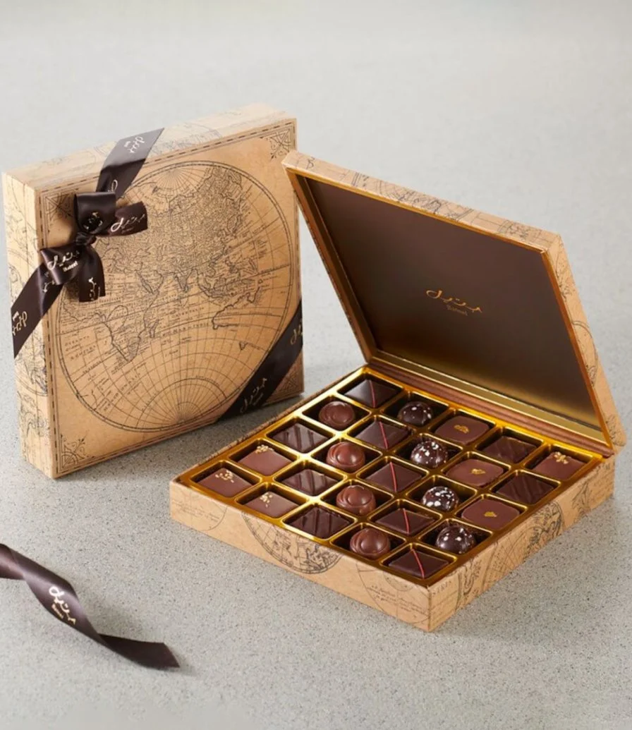 صندوق خريطة العالم وسط شوكولاتة من بتيل