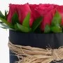 Red Roses in Black Round Black Box